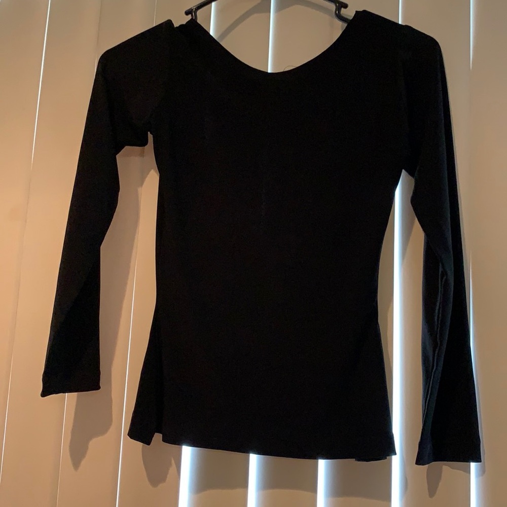 Backless shirt in black. Size XS-S